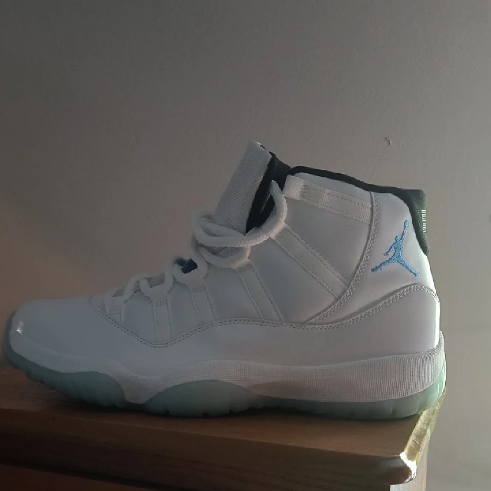 Jordan White and Light Blue High-Top Sneakers - Picture 1 of 6